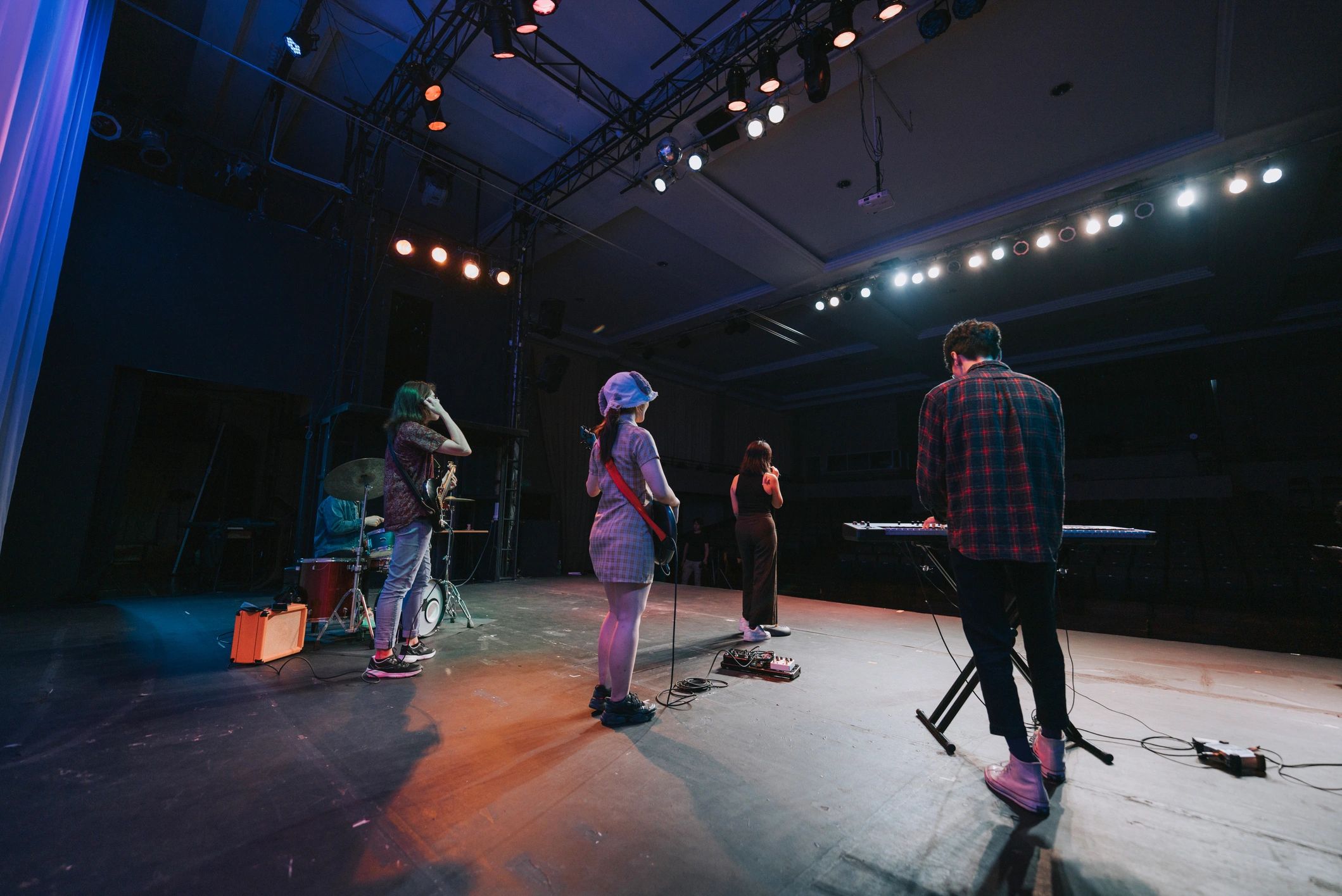 Live performance stage with singer and band