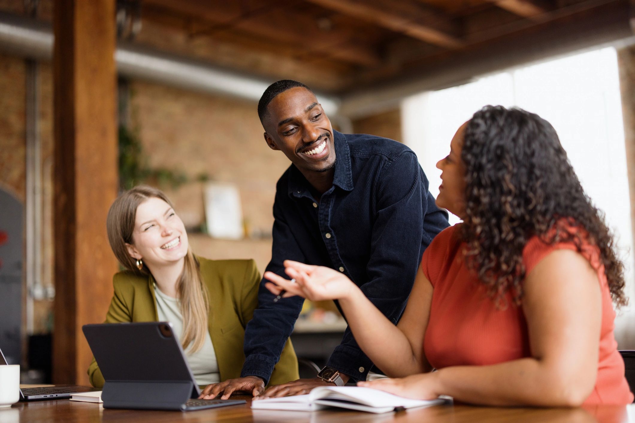 Creative team collaborating on event planning in an office